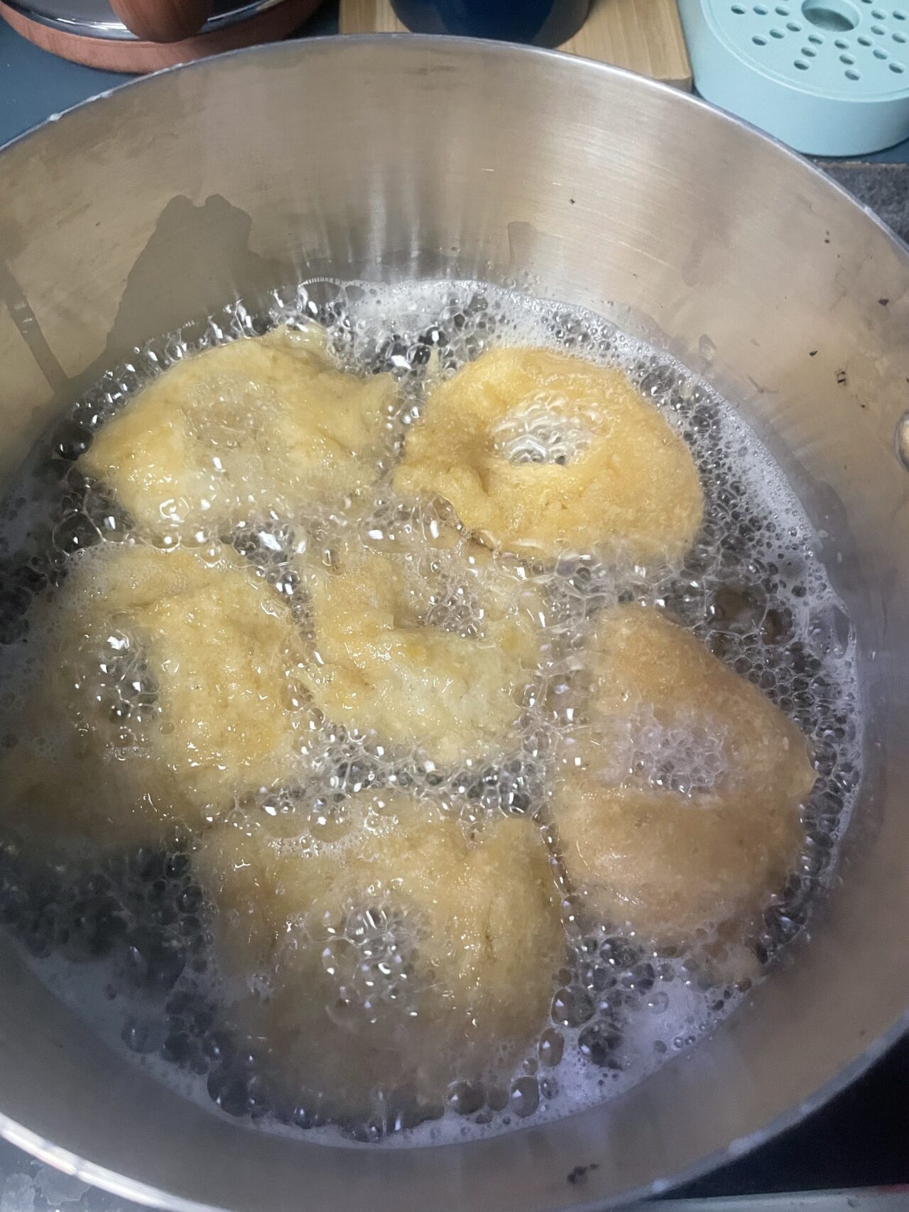 A pan of food is being cooked in the kitchen.